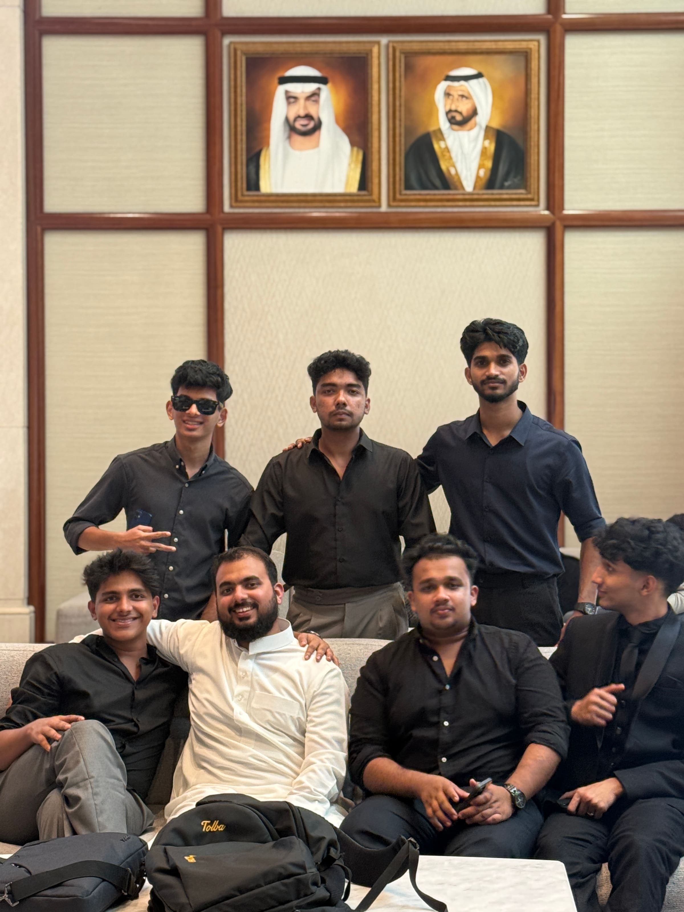 Students together in a lounge before an off-campus visit